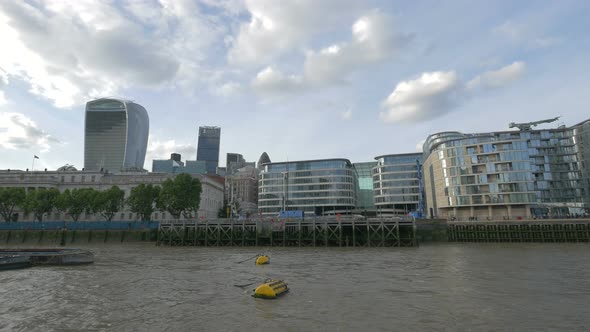 Modern buildings on the riverside in London alt
