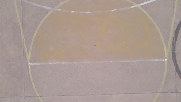 Drone Panning Away From Empty Basketball Court