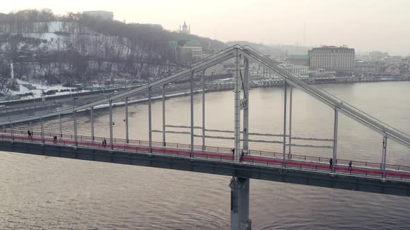 Red Pedestrian Bridge Across the River