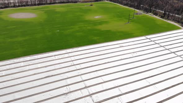 Modern technology in agriculture. Green fields covered with mulch foil. Agronomy concept. alt