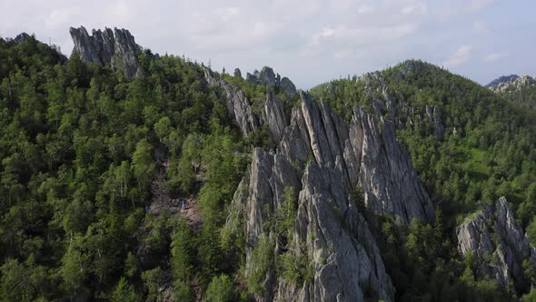 Aerial View Drone Moving Near a Rocky Cliff