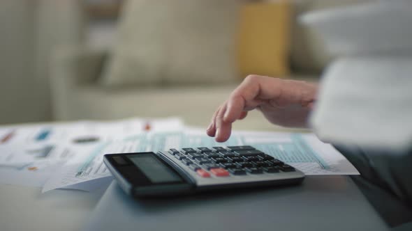 Using Calculator For Bills Counting alt