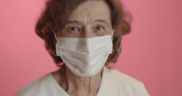 Old Woman Wearing Surgical Mask
