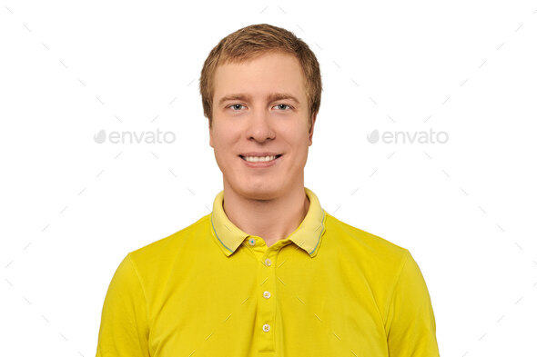 Portrait of funny young male in yellow T-shirt isolated on white background, handsome happy man - Stock Photo - Images