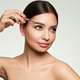 Beautiful woman puts mascara on her eyebrows - PhotoDune Item for Sale