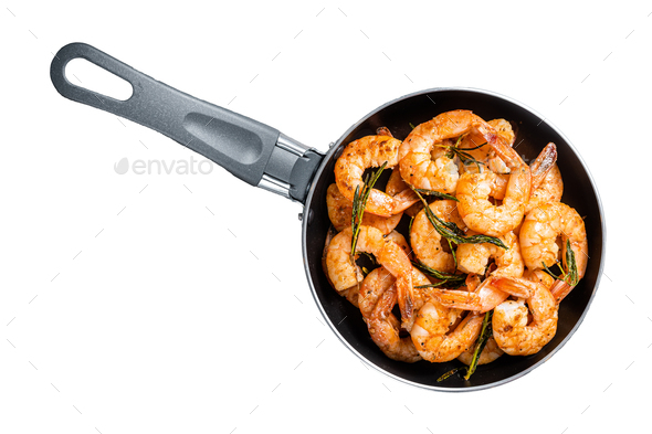 Fried with butter and garlic prawns shrimps in a skillet. Isolated on white background