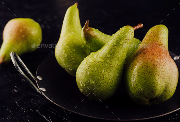 Fresh ripe organic yellow pears with water drops Stock Photo by