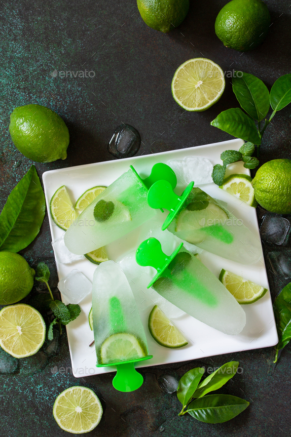 Summer refreshing homemademojito popsicles with lime juice and mint, mojito fruit ice. - Stock Photo - Images