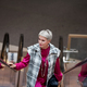 Fashionable stylish aged woman with gray hair standing on escalator - PhotoDune Item for Sale