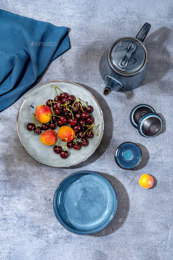 Modern still life with a set of blue crockery. Blue ceramic tableware crockery set