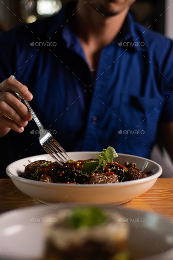 Mushroom risotto. Main dish. Italian food. Person eating Stock Photo by ...
