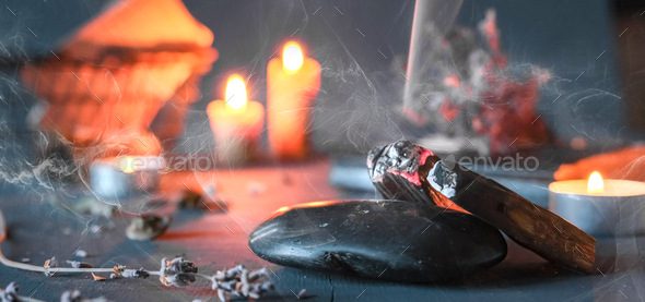 Tarot, astrology,Esoteric, Occult mystical ritual scene of sorcery tarot candles,dried flowers, palo - Stock Photo - Images