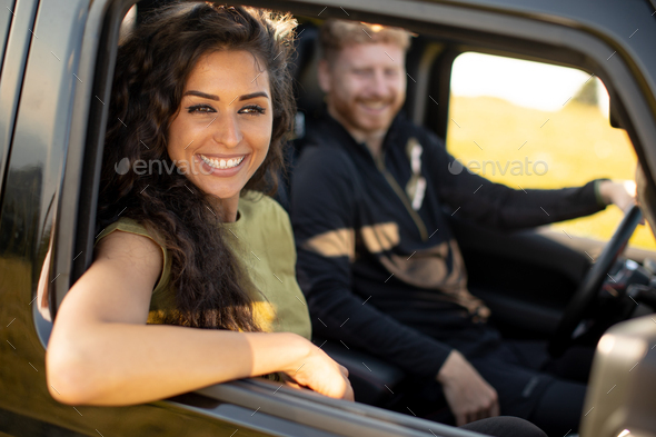 Couple having fun on roadtrip - Stock Photo - Images