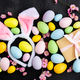 Stylish background with colorful easter eggs on dark concrete background with blooming branches - PhotoDune Item for Sale