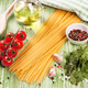Pasta And Cooking Ingredients On Green Wooden Background. - PhotoDune Item for Sale