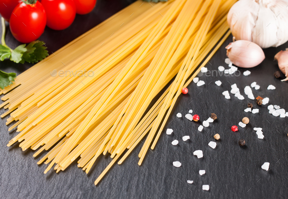 Pasta And Food Ingredients On Black Background. - Stock Photo - Images