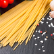Pasta And Food Ingredients On Black Background. - PhotoDune Item for Sale