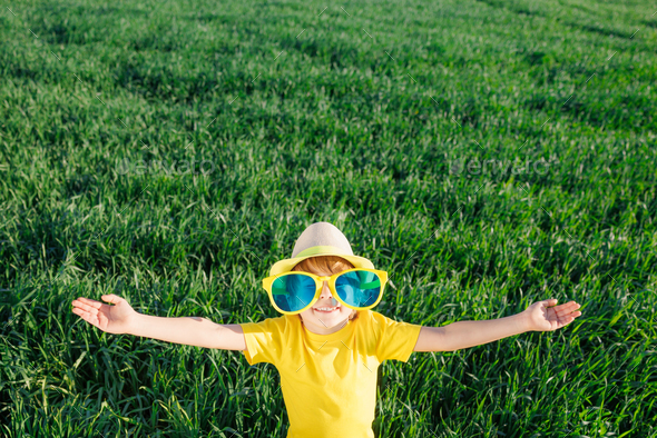 Happy child in spring outdoor - Stock Photo - Images