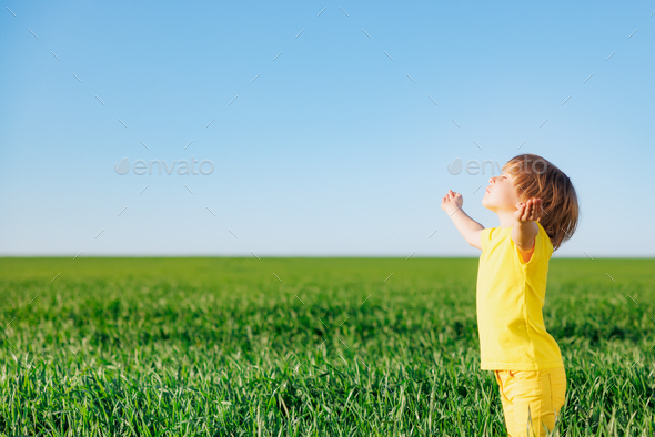Happy child in spring outdoor - Stock Photo - Images