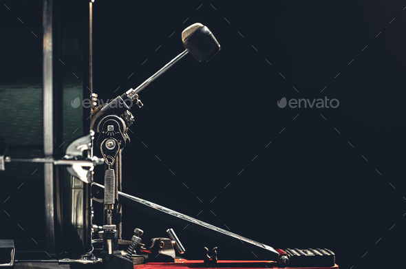 Bass drum with pedal, musical instrument on black background. - Stock Photo - Images