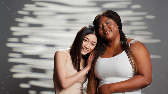 Diverse models feeling powerful posing for beauty ad