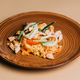 Rice with seafood, calmari and cucumber on brown plate - PhotoDune Item for Sale