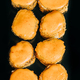 Warm sushi rolls in dried breadcrumbs with mustard on black background - PhotoDune Item for Sale
