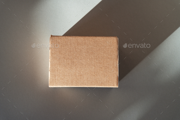 Overhead view of Cardboard with copy space on gray background.  - Stock Photo - Images