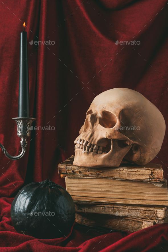 Spooky Halloween Candle on Ancient Skull