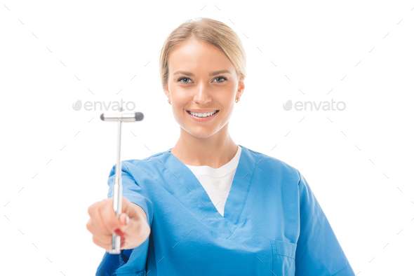 happy young neurologist with reflex hammer isolated on white