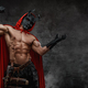 Muscular man dressed in red cloak and black mask - PhotoDune Item for Sale