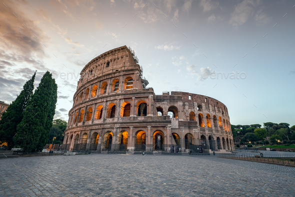 The famous Colosseum at sunrise - Stock Photo - Images