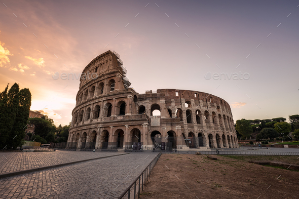 The famous Colosseum at sunrise - Stock Photo - Images