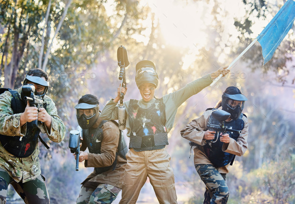 Teamwork, paintball and capture the flag in celebration for winning, victory or achievement standin - Stock Photo - Images