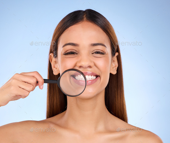 Magnifying glass, woman and portrait in studio for skincare analysis, dermatology and laser cosmeti