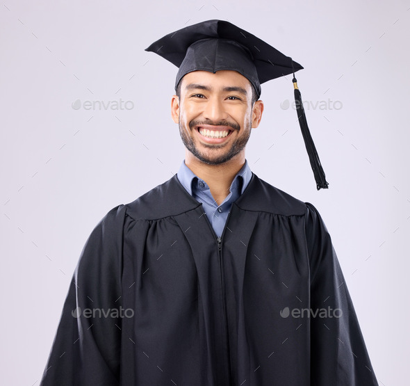 Studio portrait of a man in graduation cap and gown