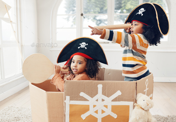 Pirate, box and telescope with children in living room for playful, creative and imagine. Fantasy,