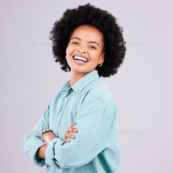 Arms crossed, laugh and portrait of black woman in studio for ...