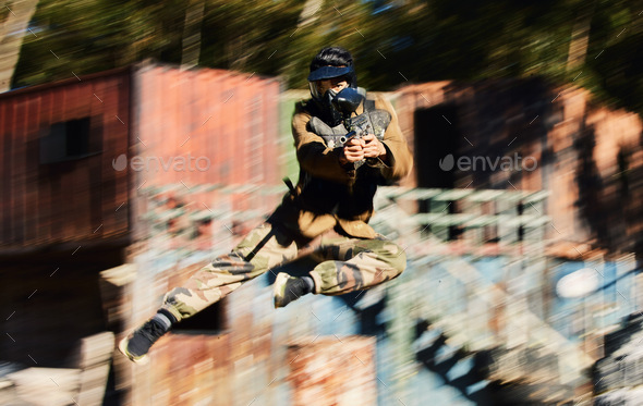 Blurred, military and man shooting in paintball, army training and fitness test for war. Sports, g