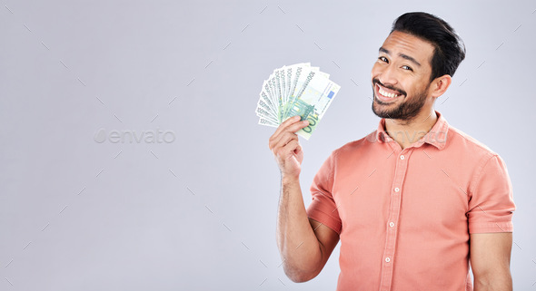Asian man, portrait and money fan on isolated background for financial freedom, stock market profit