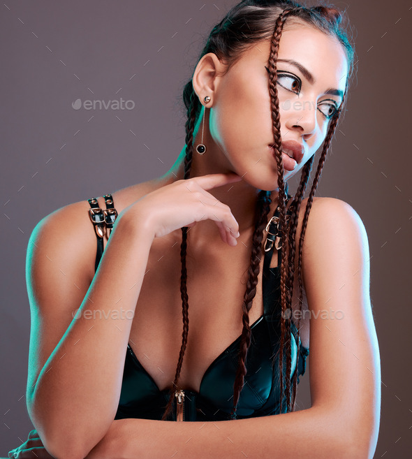 Fashion, grunge and black woman in studio with gen z aesthetic, punk and rocker on brown background