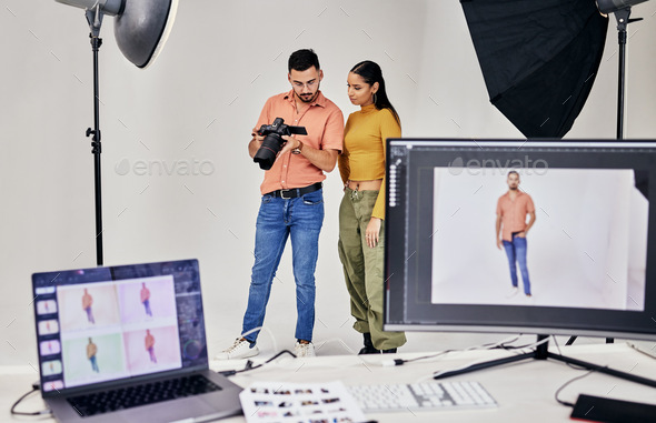 Collaboration, photographer and startup people in studio set with camera for shoot, magazine projec - Stock Photo - Images