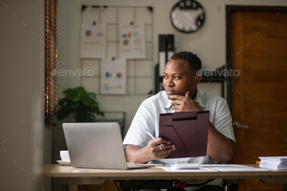 Stressed man professional sitting at office workplace, Tired and overworked businessman, Young - Stock Photo - Images