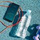 Mobile workout app with difficulty levels, jump rope, dumbbells and water bottle, top view.  - PhotoDune Item for Sale