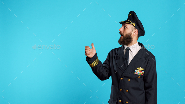 Airline pilot pointing to left or right sides on camera