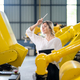 businesswoman checking robot are in a factory  - PhotoDune Item for Sale