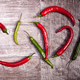 Spicy pepper on wooden background - PhotoDune Item for Sale