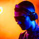 Club DJ playing music at party wearing sunglasses - PhotoDune Item for Sale