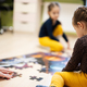 Children connecting jigsaw puzzle pieces in a kids room on floor at home.   - PhotoDune Item for Sale