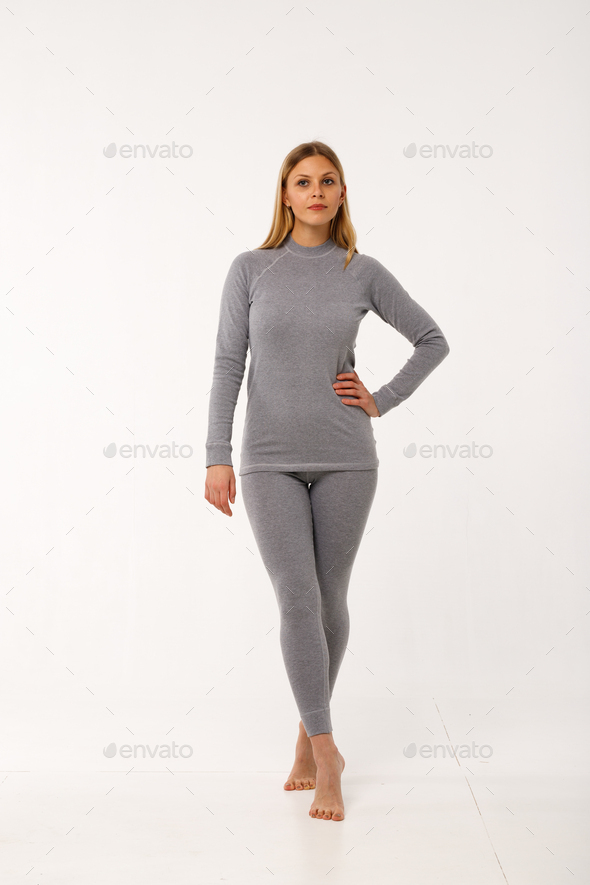 Sporty blonde girl in thermal clothing for women Stock Photo by 4otograf